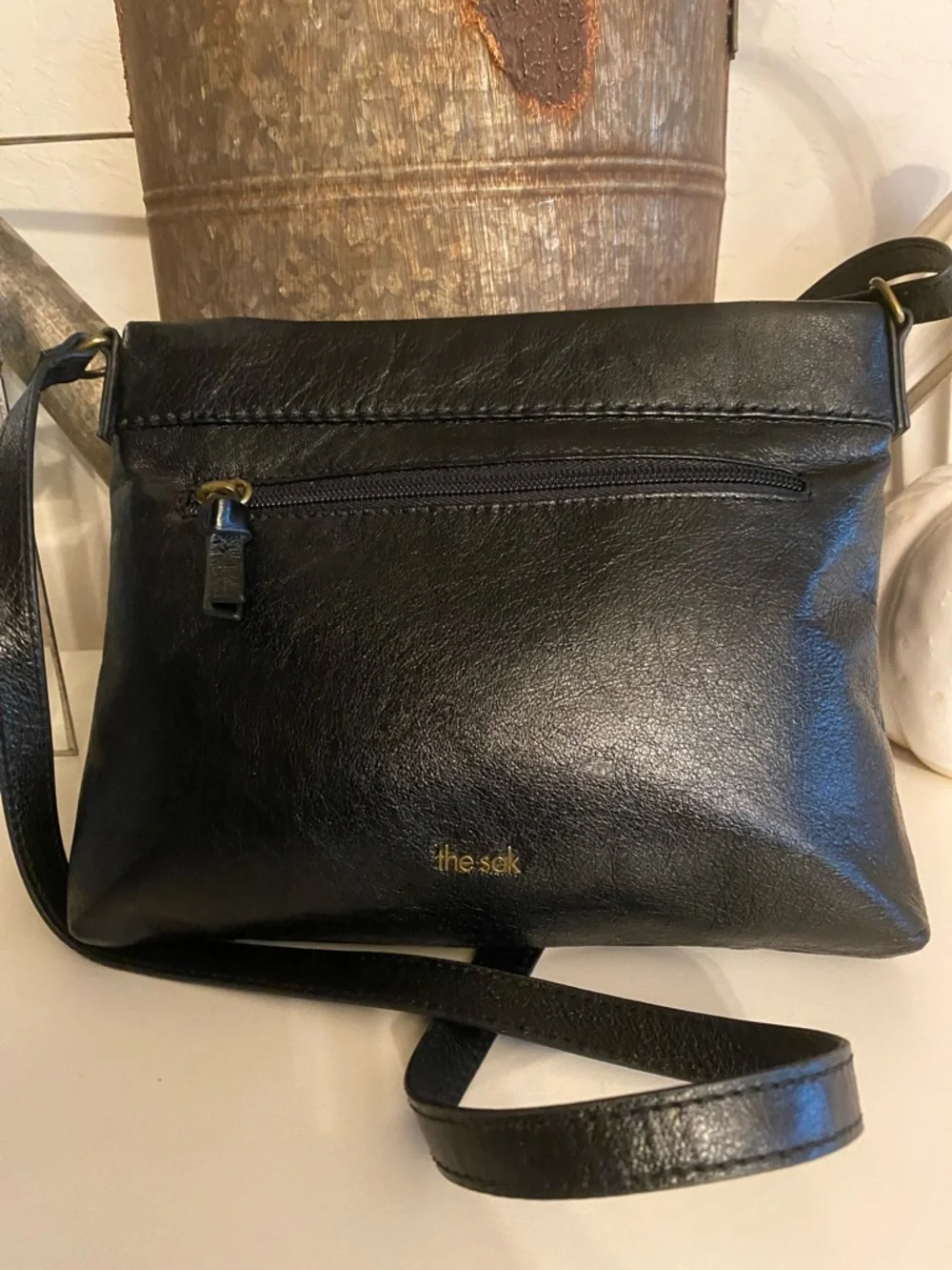 The Sak Sanibel Black Leather Floral Embossed Mini Crossbody w/ Gold Hardware - Picture 3 of 11